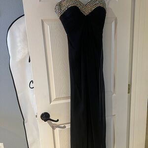 Elegant Black Strapless Dress with Embellished Gold Bodice